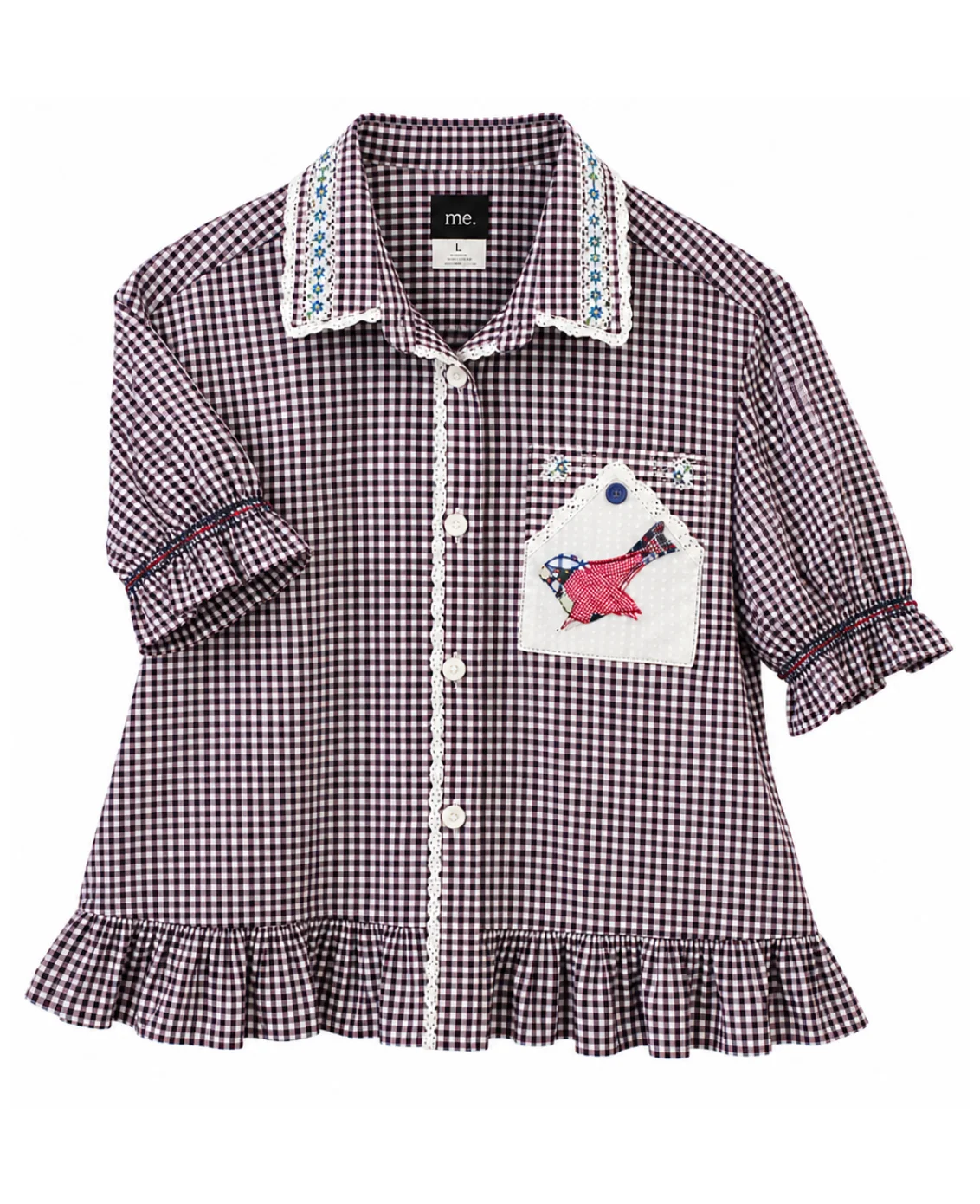 A classic gingham blouse with a playful, unexpected twist.
